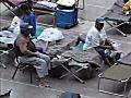 Hurricane Katrina evacuees sit inside the Astrodome in Houston.